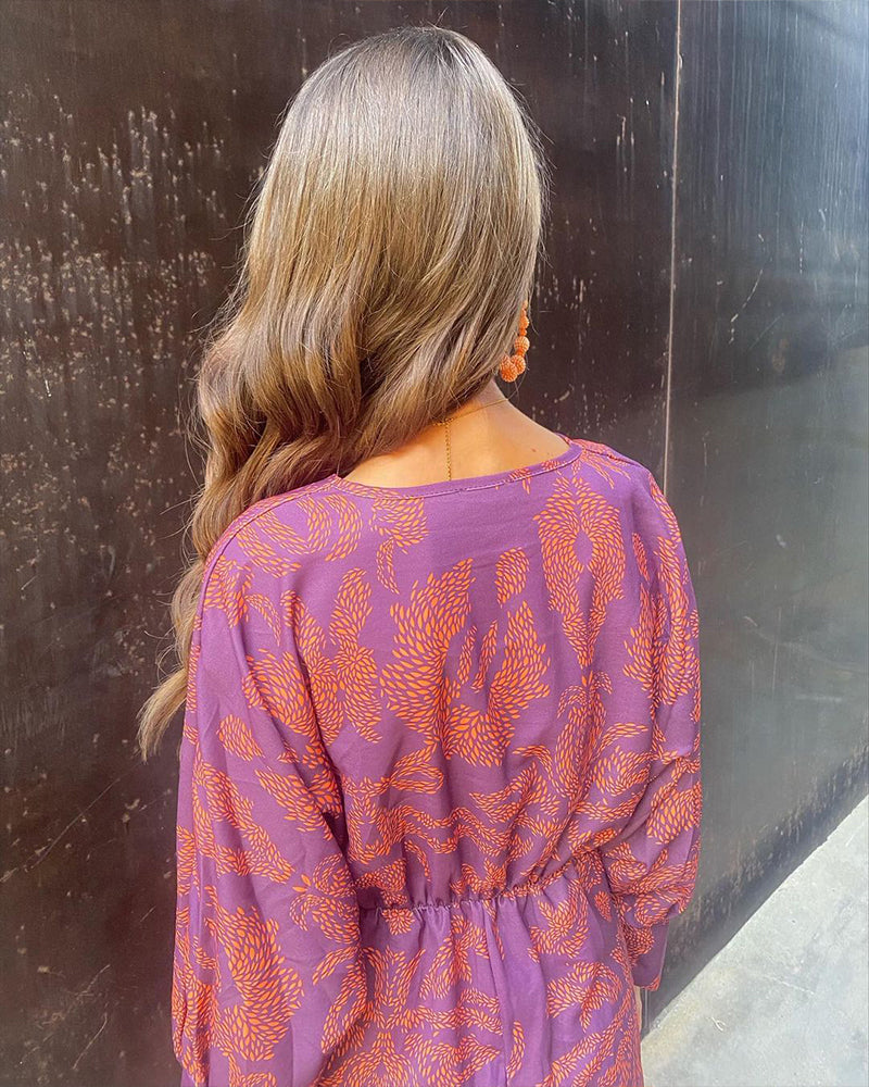 Vestido elegante de mujer de manga larga
