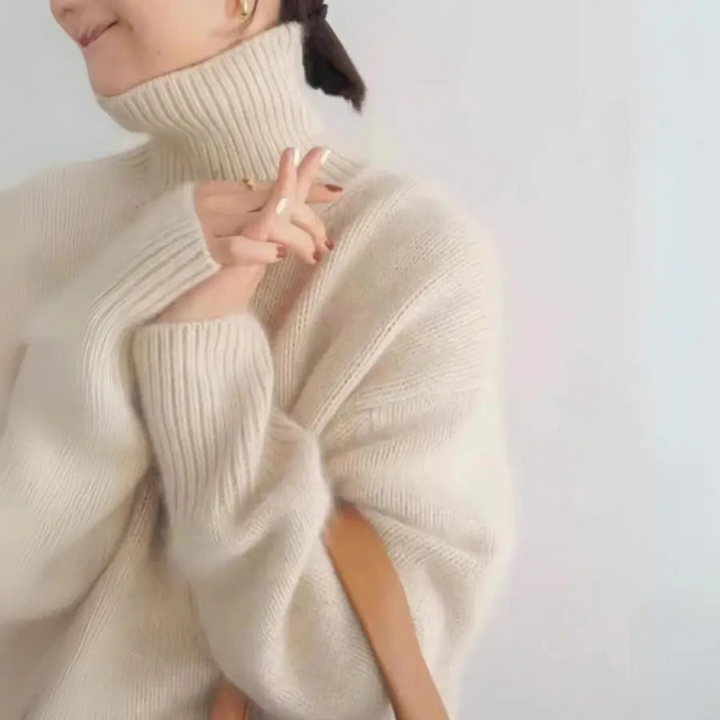 Eleganter Damenpullover aus Wolle mit weitem Schnitt und hohem Kragen
