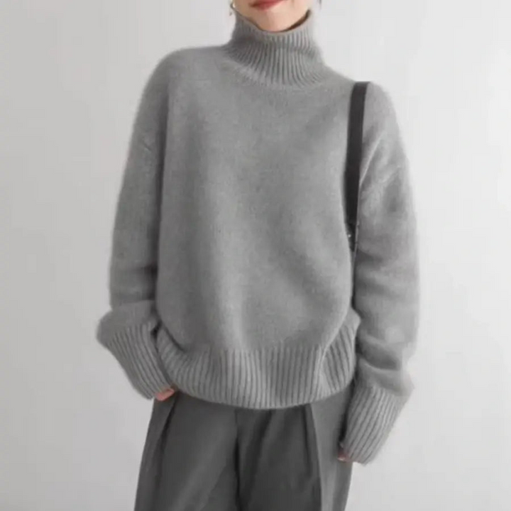 Eleganter Damenpullover aus Wolle mit weitem Schnitt und hohem Kragen
