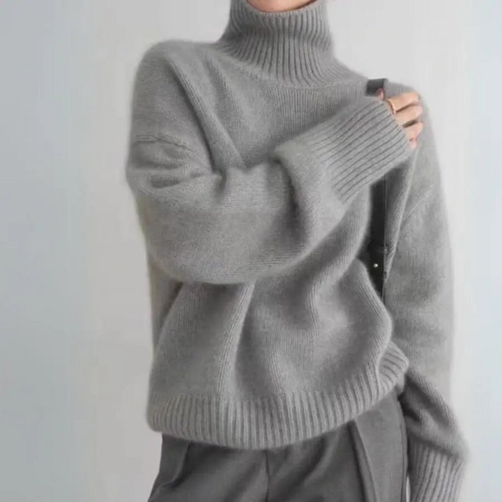Eleganter Damenpullover aus Wolle mit weitem Schnitt und hohem Kragen